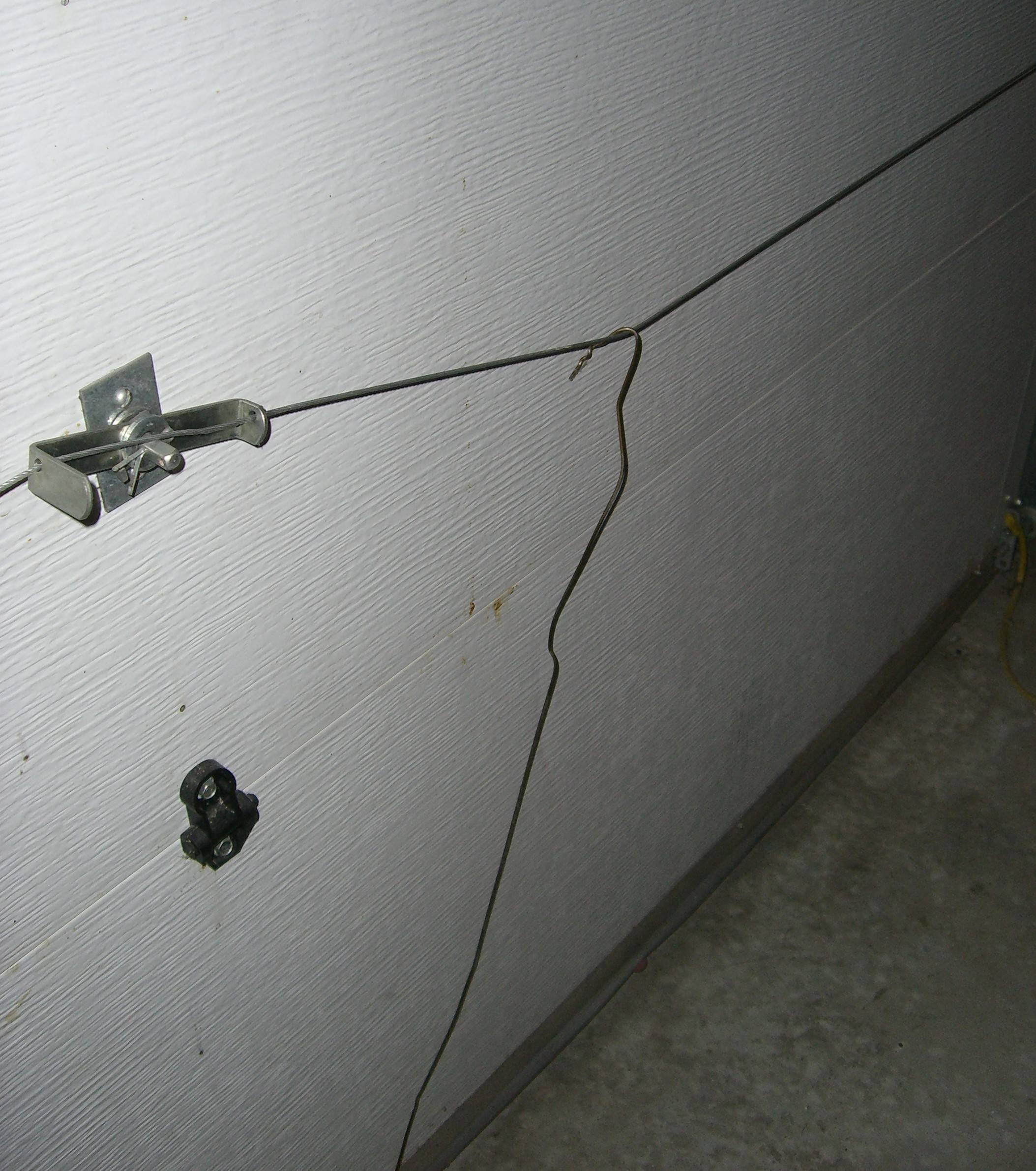 Hanger retracting cable-operated latches