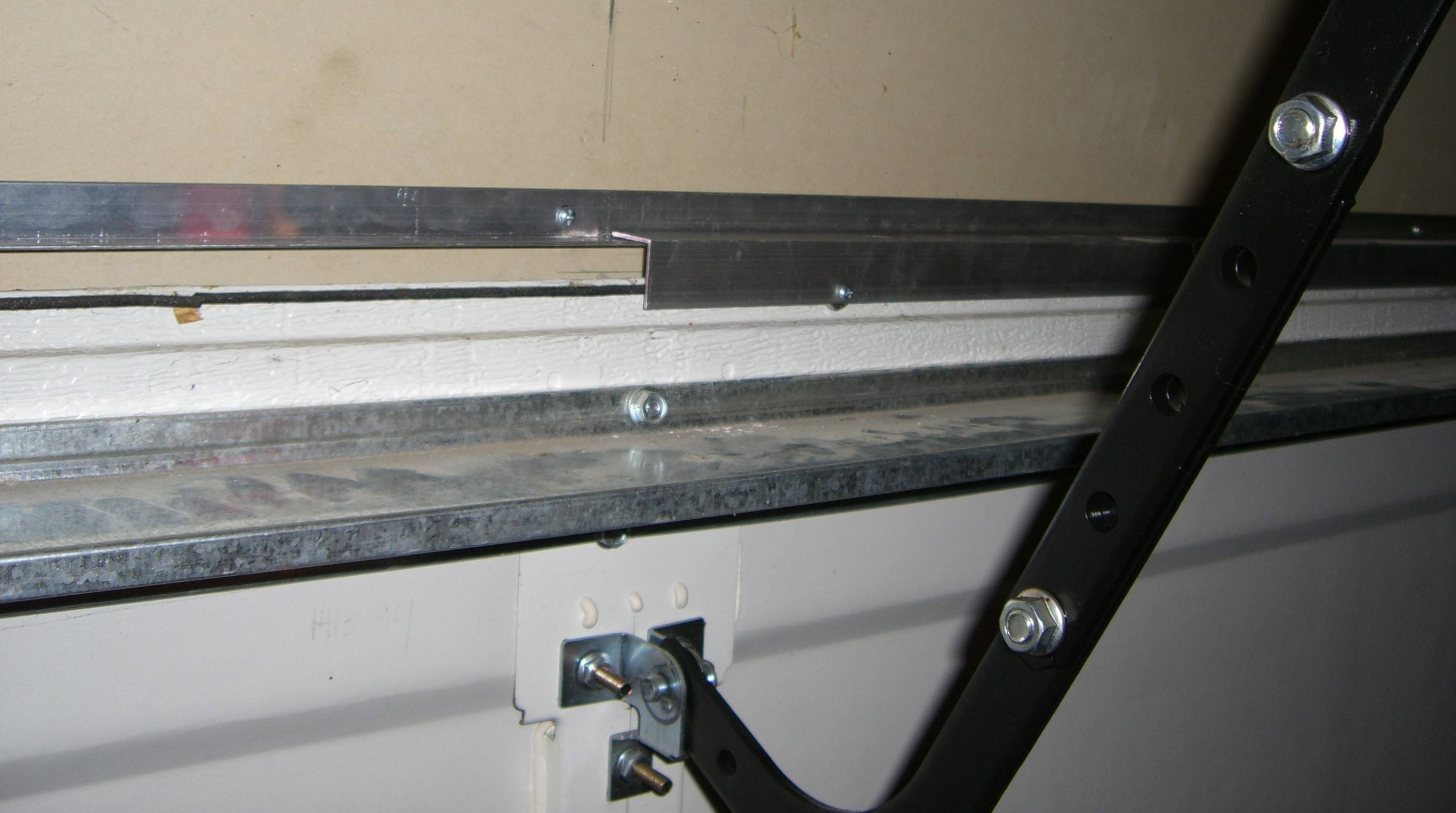 Left door-mounted security-barrier installed (1/16" x 1" x 8" angle-aluminum)